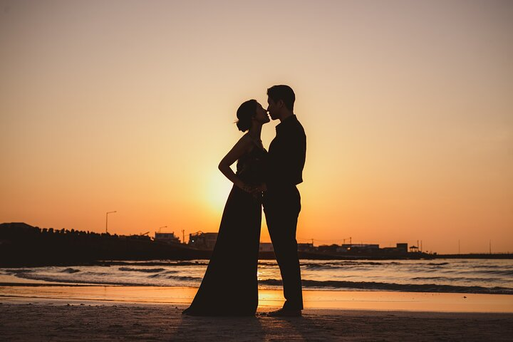 Capture unforgettable moments in Jeju as you pose against stunning sunsets with the island's breathtaking landscapes enhancing your wedding photography experience in three picturesque locations.